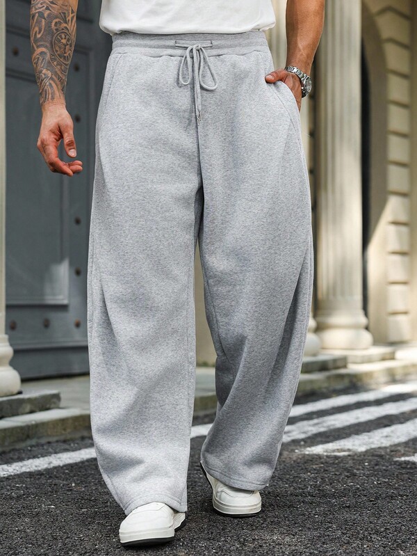 Manfinity Homme Plus Size Men's Solid Color Drawstring Waist Pockets Wide Leg Loose Casual Sweatpants