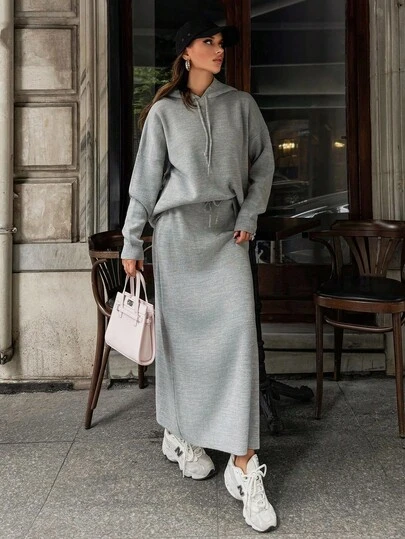 EURMUSE Casual Solid Color Melange Yarn Plain Patter Oversize Loose Relaxed Fit Drop Shoulder Sweater With Hoodie & Maxi Drawstring Detailed Solid Color Knit Skirt 2 Pieces Knit Set For Fall Winter Women Outfits Grey Two Piece Set Two Piece Lounge Set Womens Two Piece Sweater Set Comfortable Two Piece Set Sweatsuits For Women