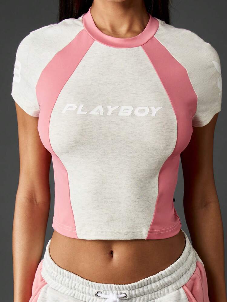 Missguided x Playboy Retro Farbblock Baby T-Shirt mit Raglanärmeln und kontrastierendem rosa Paneel-Detail, kurze Ärmel Crop Top