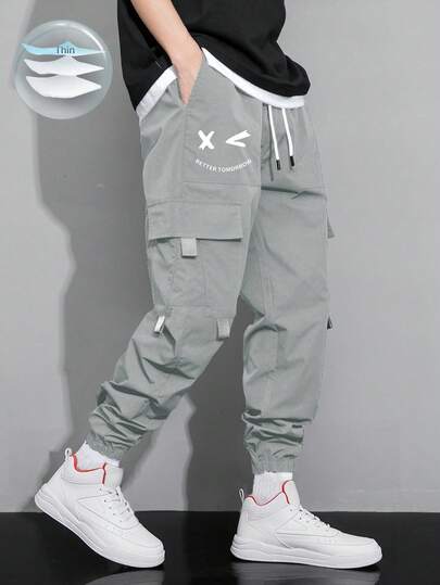 Claim Dot Pantalones cargo con estampado de expresión, bolsillo con solapa y cordón en la cintura, para otoño