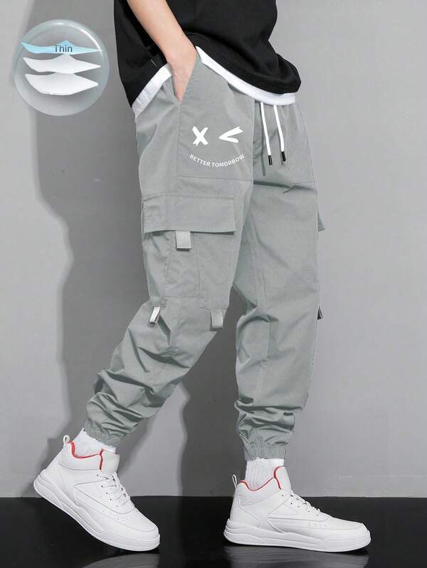 Claim Dot 男士表情印花翻盖口袋抽绳腰工装裤，适合秋季