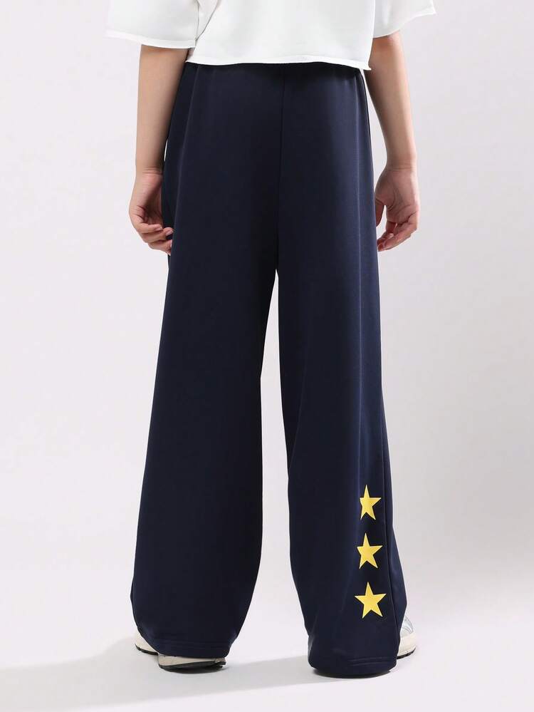 Jogginghose mit weitem Bein und Textgrafiken und Sternen