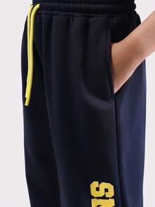 SUMWON 宽松少女阔腿慢跑裤，饰有黄色文字图案和星星细节，休闲街头风秋冬下装，舒适百搭 - 藏蓝色 - 查看 7