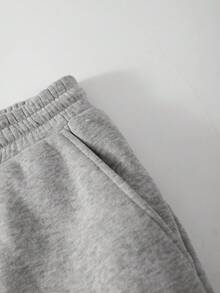 Manfinity EMRG بنطلون رياضي كاجوال للرجال بجيب على شكل نجمة خماسية الأضلاع وسحاب