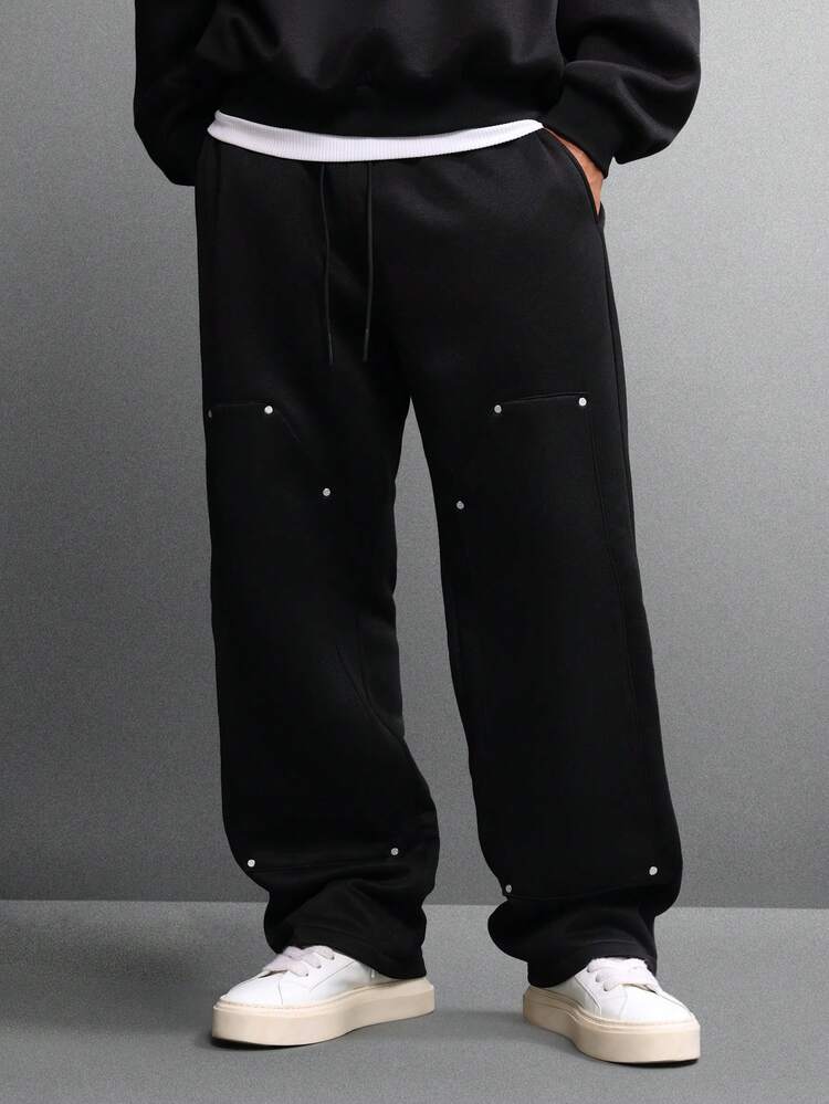 Calça de moletom folgada com bolsos laterais