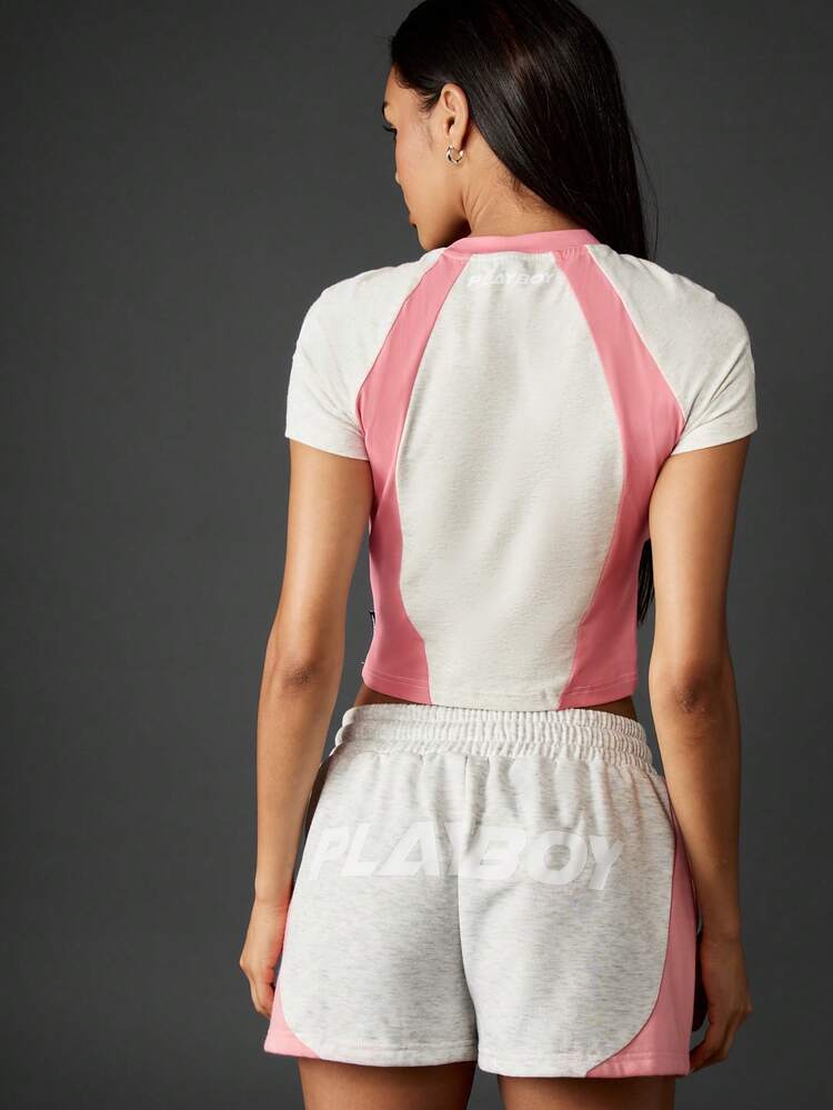 Missguided x Playboy Retro Farbblock Baby T-Shirt mit Raglanärmeln und kontrastierendem rosa Paneel-Detail, kurze Ärmel Crop Top
