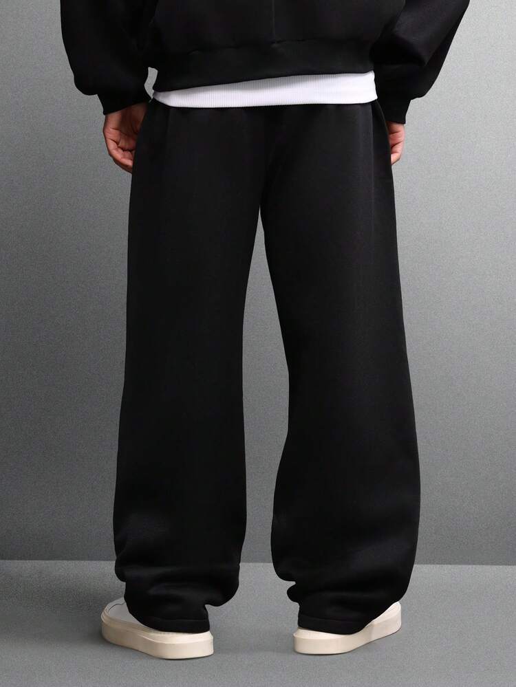 Calça de moletom folgada com bolsos laterais