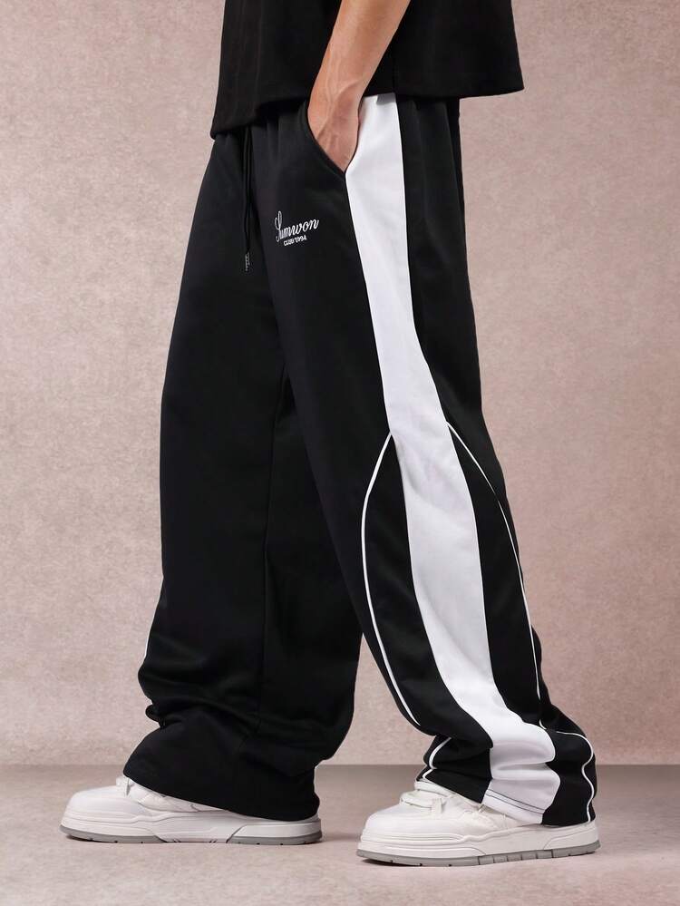 Pantalones deportivos con detalle de rayas laterales