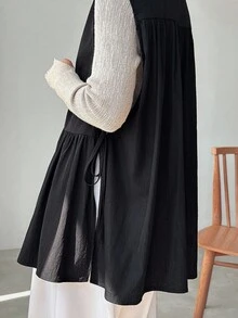 FRIFUL Women's Sleeveless Shirt With Ruffle Hem Patchwork, Loose Solid Color Blouse - Black - View 1