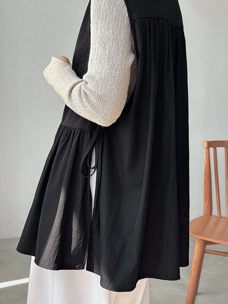 FRIFUL Women's Sleeveless Shirt With Ruffle Hem Patchwork, Loose Solid Color Blouse - Black - View 1