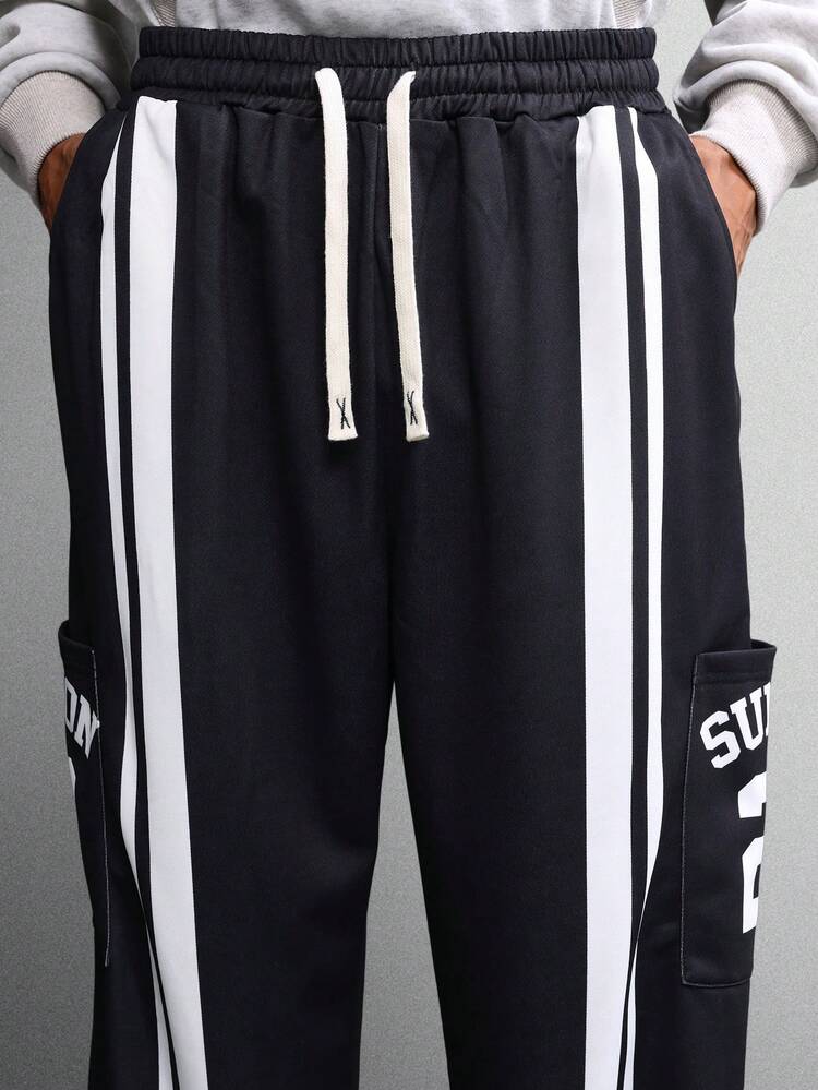 Relaxed Track Pants With Side Stripes And Text Detail