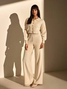 CLARA VERO Elegante set a due pezzi in maglia color crema con dettagli in oro e pantaloni larghi da lounge