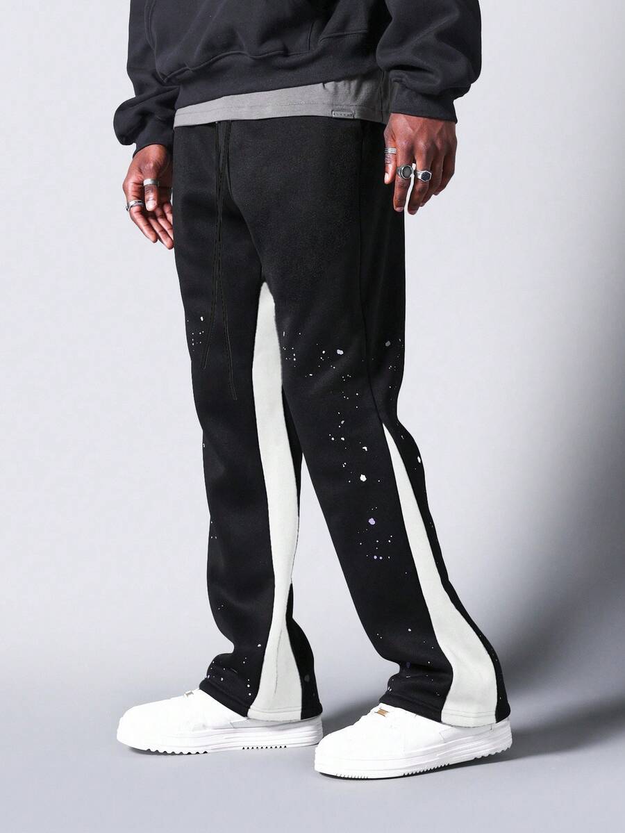 SUMWON 侧边条纹细节做旧泼墨印花喇叭运动裤，冬季假日节日宽松休闲街头风纯色款 - 黑與白 - 查看 1