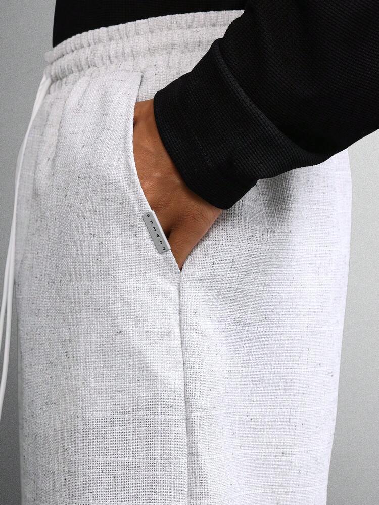 Pantalon large texturé mélangé avec cordon de serrage