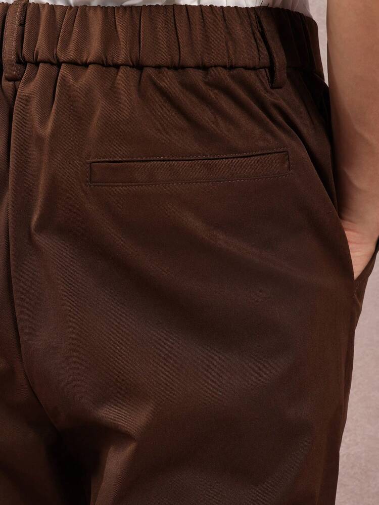 レトロなデザインのフレアワイドレッグツイルトラウザーズ