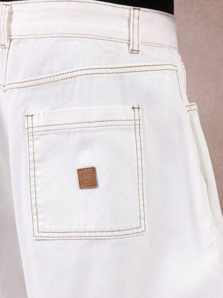 Jeans da carpentiere a gamba larga con dettagli a pannello