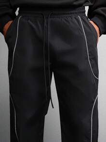 SUMWON 宽腿黑色尼龙运动裤，带反光对比滚边，运动休闲街头服饰，四季宽松下装，时尚都市服饰 - 黑色 - 查看 6