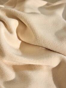 CLARA VERO Elegante set a due pezzi in maglia color crema con dettagli in oro e pantaloni larghi da lounge