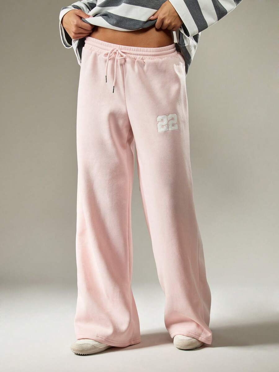 MISSGUIDED 阔腿运动裤休闲家居服高腰宽松版型数字标志冬季舒适裤抽绳松紧腰舒适家居日常穿着 - 粉色 - 查看 1