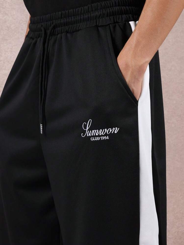 Pantalones deportivos con detalle de rayas laterales