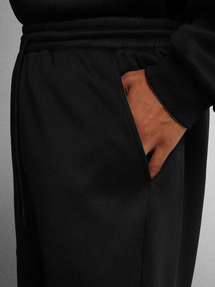 Calça de moletom folgada com bolsos laterais