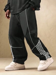 SUMWON Pantalones de chándal con detalles de rayas de contraste en los paneles laterales, fondo deportivo clásico de pierna ancha con cordón, bolsillos laterales, ropa urbana y deportiva de otoño e invierno, estilo moderno de ocio activo - Negro - Ver 3