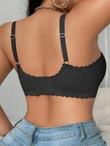 SHEIN Sujetador para mujer de talla grande con diseño minimalista y cómodo, de unicolor, con encaje sin costuras, tirantes anchos, efecto levantador, bajo ondulado y acolchado fino - Negro - Ver 6
