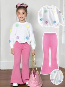 SHEIN Set de 2 piezas: Sudadera de cuello redondo de manga larga con textura floral blanca y pantalones acampanados rosas para niñas, un conjunto lindo y elegante, cómodo para primavera y verano