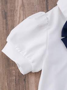 Girls' Navy Academic Style Cap Sleeve Collar Badge 3D Bowknot Shirt And Criss-Cross Flare Sleeve Pleated Suspender Skirt Set Cute School Clothes Uniform