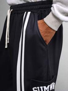 SUMWON 侧条纹运动裤 宽松休闲街头风抽绳裤 运动性能裤 时尚宣言 宽松版型 - 黑色 - 查看 7