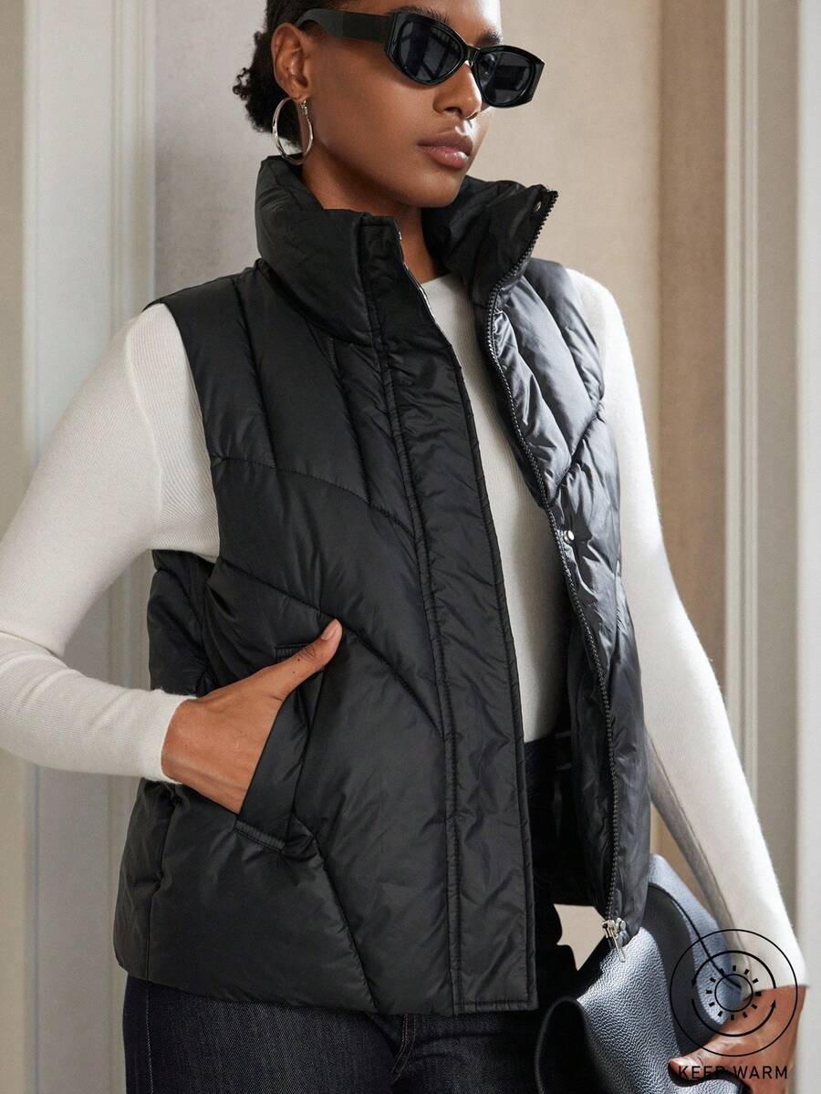 GENKIRA New Fashionable Casual Chic Minimalist Zip-Up Stand Collar Pocket Sleeveless Padded Vest Jacket, Sophisticated Design - Black - View 1