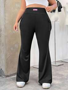 SHEIN EZwear Women Plus-Size Knitted Elastic Solid Color Flare Pants With Pocket
