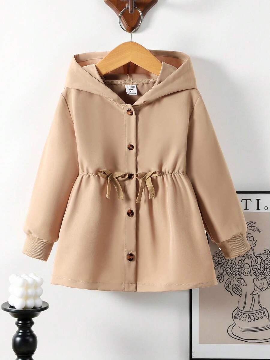 Genkimix Kids Áo khoác cho bé gái, áo khoác thời trang thường ngày cho mùa xuân và thu trở lại trường học, màu kaki trơn, trang trí nơ 3D, thắt lưng họa tiết xương cá, thiết kế eo tối giản, cúc màu hổ phách, áo khoác dài tay có mũ, phù hợp cho bé gái trở lại trường học vào mùa xuân và mùa thu, dễ thương và thời trang cho trường học, hoạt động ngoài trời, họp mặt gia đình, chụp ảnh hàng ngày, du lịch mùa thu đông. - Màu Khaki - Xem 1
