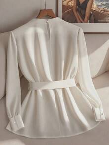 Franclia Áo sơ mi nữ cổ tròn, tay dài, cạp chun đơn giản, mặc đi làm hàng ngày. Áo sơ mi nữ tay dài thanh lịch, mặc đi làm. Áo sơ mi nữ đính ngọc trai đa năng. Áo sơ mi nữ màu trắng phối đồ thu đông, mặc đi làm mùa thu. Áo sơ mi nữ thanh lịch. - trắng - Xem 2