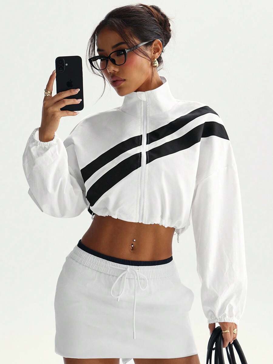 Dewbera Chaqueta deportiva con bloqueo de color, cremallera completa y dobladillo con cordón, adecuada para primavera y otoño