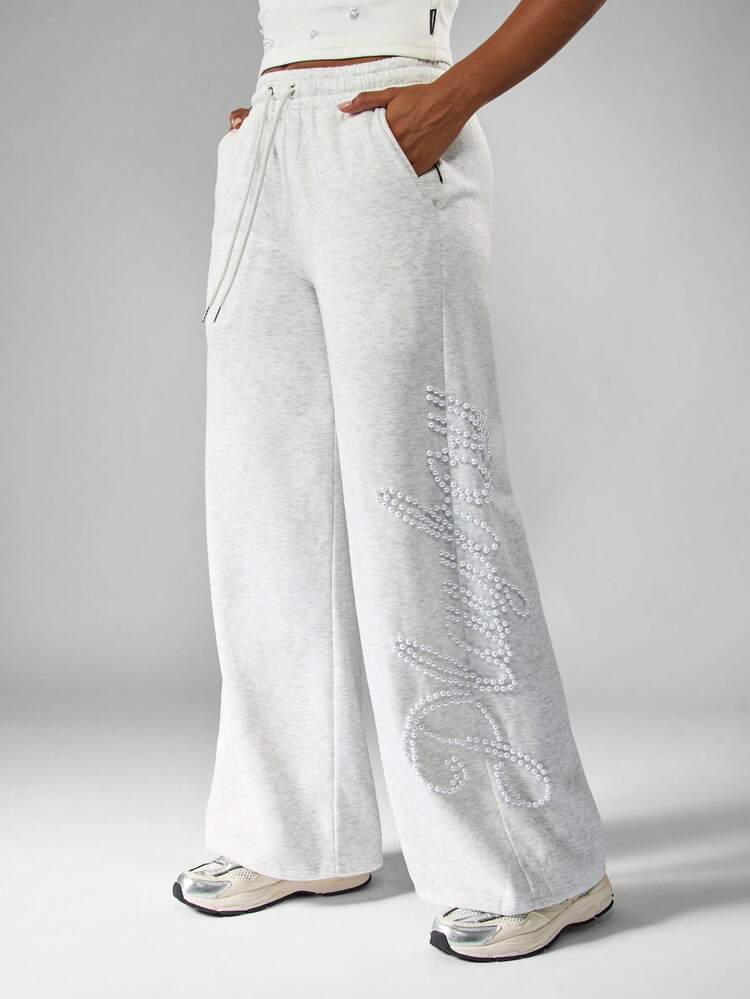 Missguided x Playboy Pantalons de jogging chiné pour femmes avec détail de texte orné de perles, taille élastique avec cordon de serrage, pantalon de survêtement décontracté