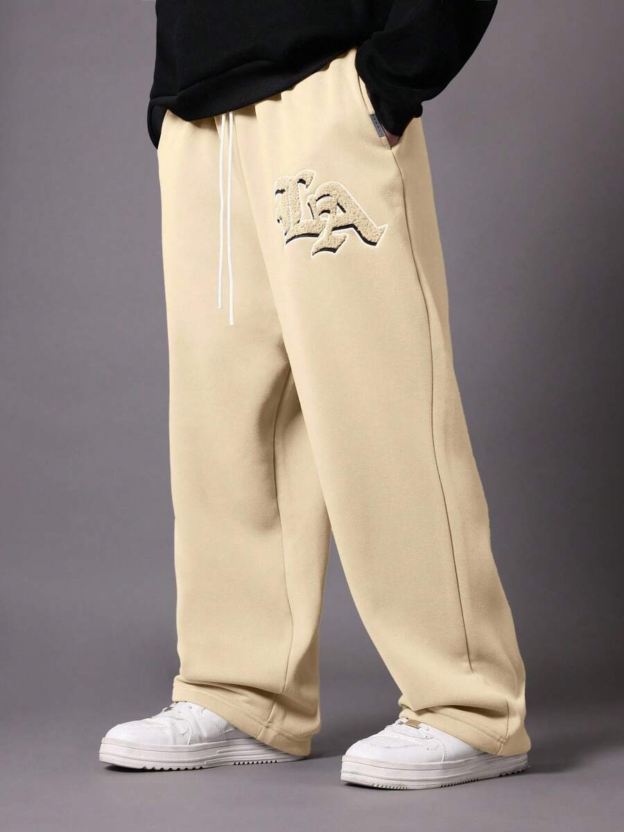 SUMWON Celana Jogger Kaki Lebar dengan Desain Aplikasi Gothic, Celana Kasual Longgar Bahan Fleece untuk Musim Dingin dan Gugur, Pinggang Bertali, Polos - Krem - View 1
