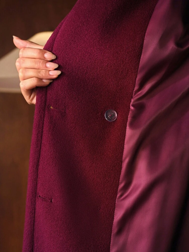 DOUBLE BREASTED BELTED OVERCOAT
