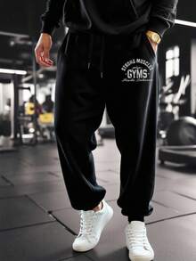 Manfinity Sport Corelite Pantaloni da jogging casual con coulisse e stampa di lettere sulla tasca, per uomo