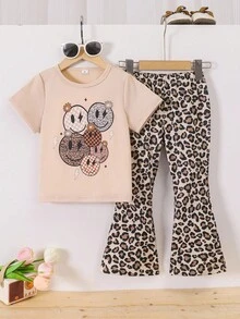 Young Girl Casual Pencil Print Round Neck Short Sleeve T-Shirt And Flare Pants Set, Summer New Arrival. Cute Face Graphic Tee, Retro Leopard Print Flare Pants, Versatile For Daily Wear And Parties - Apricot - View 3