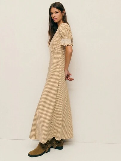 Nöista Váy Maxi Gingham Cổ Chữ V Tay Phồng, Cổ Tay Xếp Ly, Chân Váy Cài Nút Phía Trước, Xẻ Cao - Họa Tiết Kẻ Sọc Nâu Đất - Chất Liệu Dệt Nhẹ, Phối Nhiều Lớp Tuyệt Đẹp Cho Mùa Thu Đông. Hoàn hảo cho cả trang phục mùa Thu và mùa Đông dành cho nữ, chiếc váy lấy cảm hứng từ phong cách đồng quê này kết hợp hoàn hảo với bốt cao đến gối, áo khoác oversized hoặc áo len dày dặn, mang đến vẻ ngoài ấm áp cho mùa Thu và dễ dàng chuyển đổi sang các dịp Lễ, Giáng Sinh hoặc Đi Chơi.