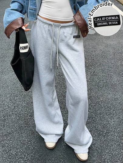 Muchica 休闲运动风格女式秋冬宽松抽绳运动裤，带刺绣字母贴片，适合日常穿着和返校季