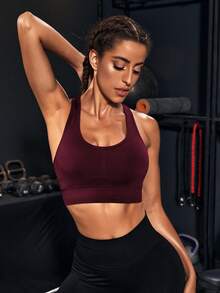 Powerista Women's Solid Color Hollow Design Everyday Fitness Sports Bra (Seamless) Seamless Sports Bra Workout Sports Bra Burgundy Sports Bra Seamless Workout Top Built In Bra Workout Top - Burgundy - View 2