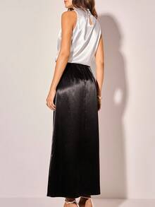 CAJUNI Falda de color negro sólido para mujer - Ropa bohemia para mujer / Ropa occidental para mujer / Ropa casual para mujer - Básica / Tops para salir para mujer / Ropa de mujer para otoño