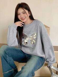 Dazy Plus Felpa oversize con fiocco e stampa a paillettes, con fodera termica, vestibilità morbida, collo a giro, maniche lunghe, colore grigio, taglia grande, adatta per l'autunno/inverno - Grigio - Visualizzare 4