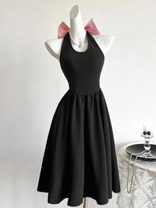 少女针织挂脖 A 字裙，收腰，大蝴蝶结后背，甜美、可爱、优雅、奢华风格，适合派对、聚会和生日活动 - 黑色 - 查看 1