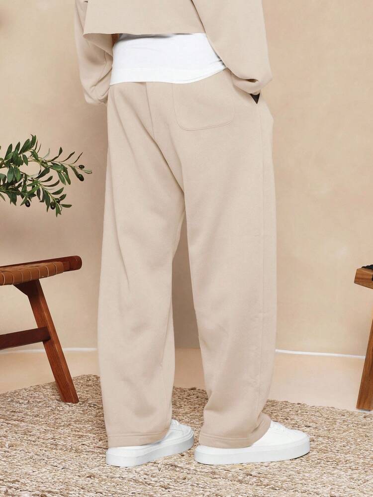 Drop Crotch Sweatpants With Elastic Ankles And Side Pockets