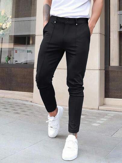 Manfinity Homme Męskie, biznesowe, casualowe, jednokolorowe spodnie wizytowe w klasycznym czarnym kolorze, modne i uniwersalne, podkreślające solidny i dostojny styl biznesowy. Idealne do codziennych dojazdów do pracy, spotkań biznesowych, przyjęć i bankietów. Te spodnie to niezbędny i wszechstronny element męskiej garderoby, a także doskonały prezent dla chłopaka lub męża.