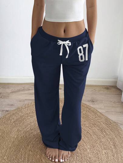 Sunnyshic Grå 87 Broderad låg midja i midjan Kontrastribbad dragsko Knytning Snett fickor Raka ben Lösa träningsbyxor, Casual hemkläder, Vardagskläder, Retrosport, Minimalistisk design, För kvinnor, Vår/Sommar