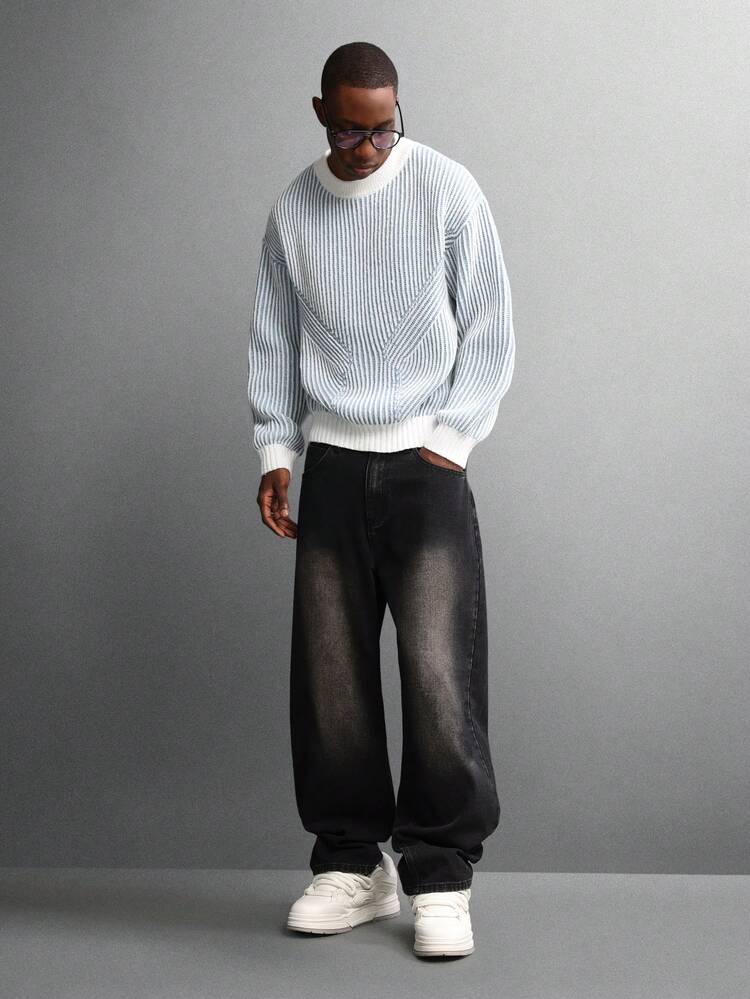 Pull ras du cou en maille côtelée technique